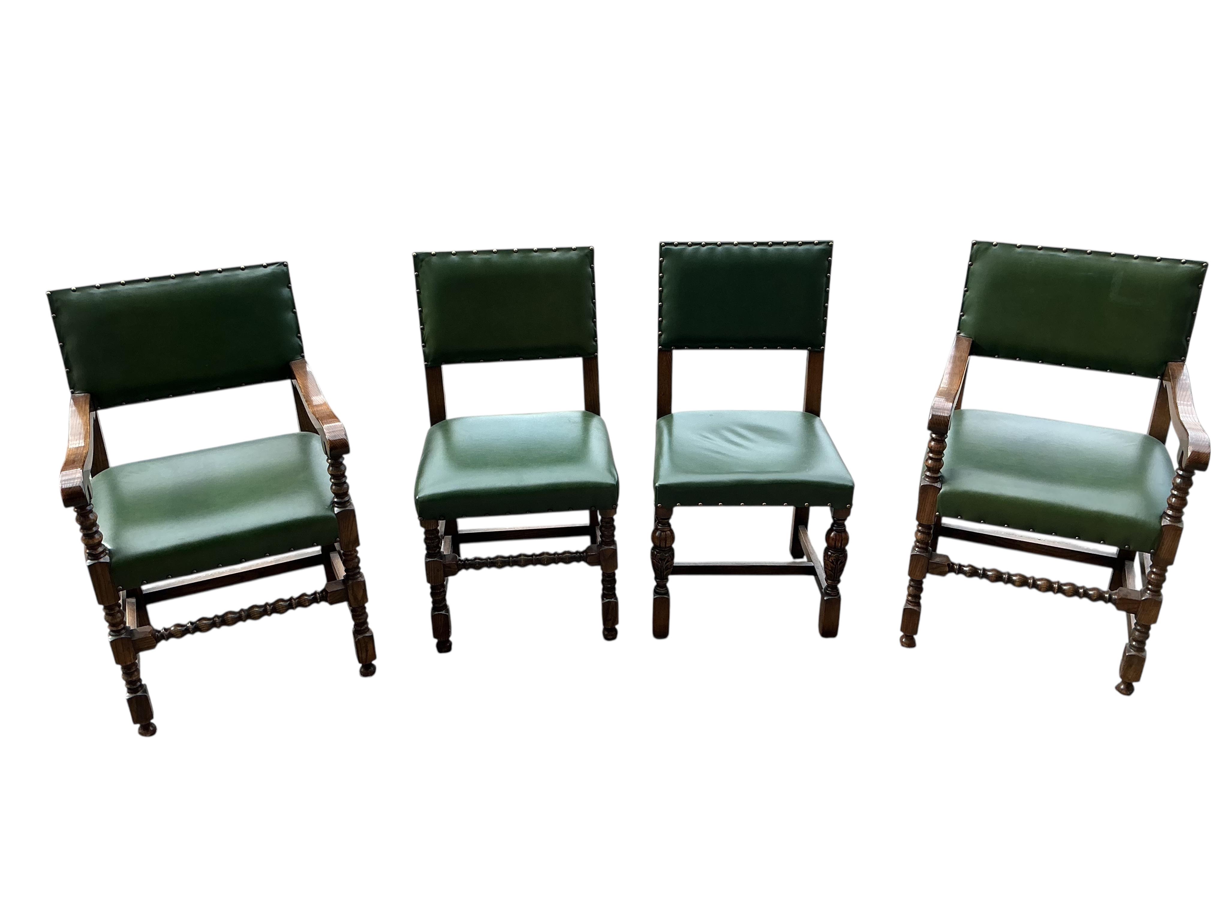 A set of twelve Bevan Funnel oak dining chairs, two with arms